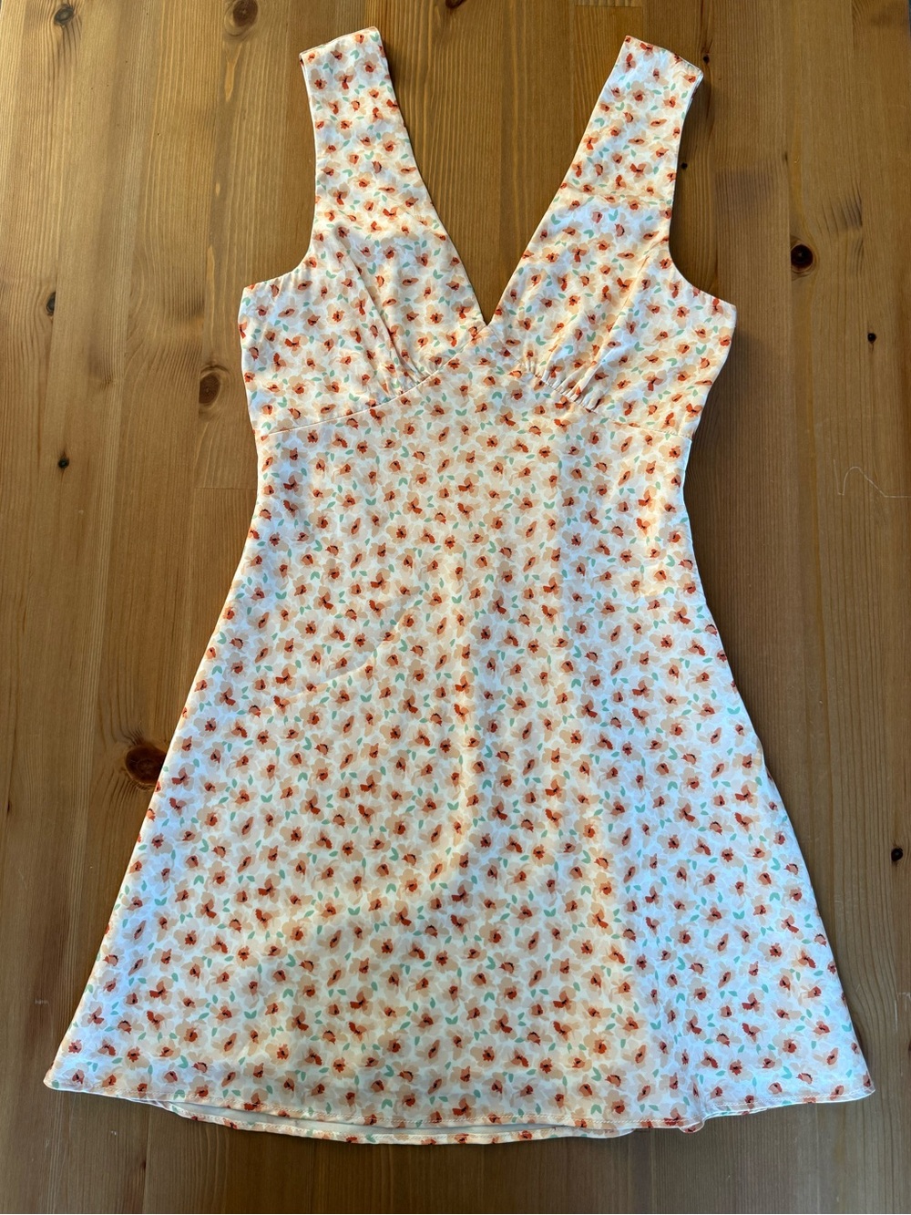 Calypso Boutique Farmer’s Market Mini Dress in Cream w/ Orange Floral Print